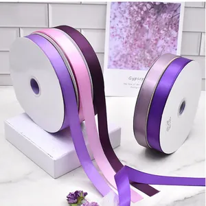 High-quality multi-color satin ribbon rolls for gift wrapping and wedding flower decoration.