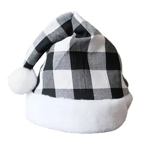 Classic black and white buffalo plaid Christmas hat with plush white trim and pom-pom