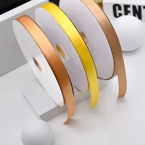 Premium 1.5cm wide single-sided satin polyester ribbon rolls for elegant gift wrapping and crafts