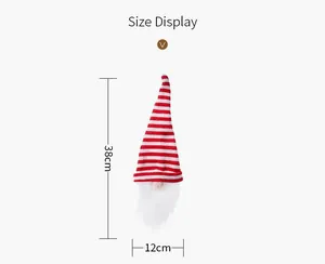 Size detail of red and white striped knitted Christmas gnome wine bottle cover with measurements