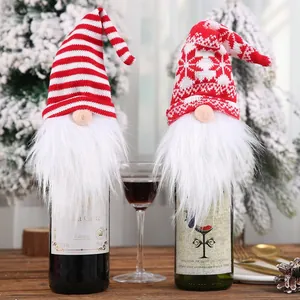 Festive Christmas wine bottle covers set featuring knitted gnome hats and long white beards