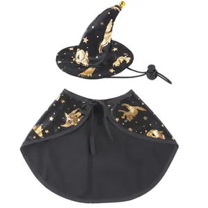 Close-up of black and gold Halloween pet wizard hat and cape set with star patterns