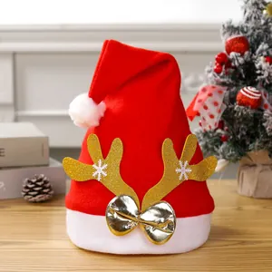 Red Christmas hat with golden reindeer antlers and metallic silver bow decoration