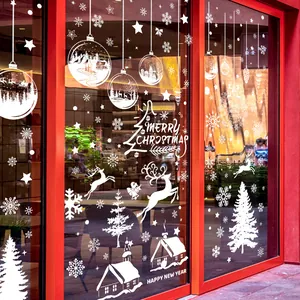 Pegatinas blancas de Navidad para ventanas con copos de nieve, renos y casas nevadas.