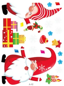 Detail of festive Christmas static window clings with Santa gnomes and gift boxes stickers