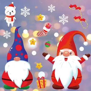 Detailed view of festive Christmas gnomes and polar bear window stickers for holiday decor.