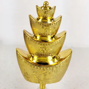 Detailweergave van een gouden gegalvaniseerde sycee-toren met vier niveaus voor feesten