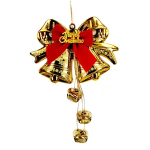 Dekorative goldene Doppel-Weihnachtsglocken mit roter Schleife und Weihnachtsgruß
