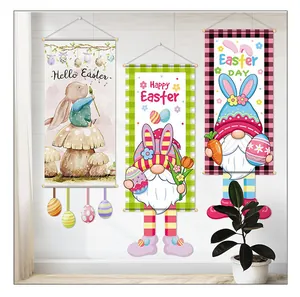 Three different cartoon Easter hanging banners displayed on a clean indoor wall