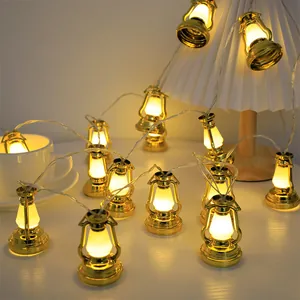 Cálido brillo amarillo de guirnaldas LED de faroles dorados vintage para la fiesta.