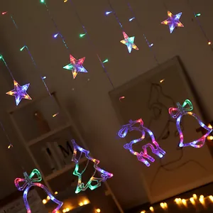 Detail view of colorful LED star and reindeer shapes on decorative curtain lights