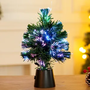 Detailed macro view of a fiber optic Christmas tree with vibrant colorful glowing lights
