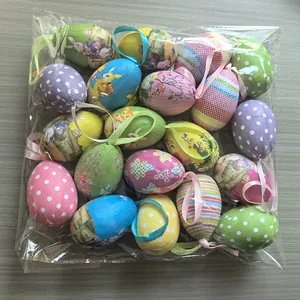Assorted colorful painted Easter eggs set in transparent packaging with hanging loops