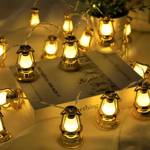Cadena de luces LED de linterna dorada vintage para decoración festiva del hogar.