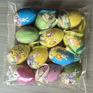 Detailed view of colorful painted Easter eggs in clear plastic packaging for party decor