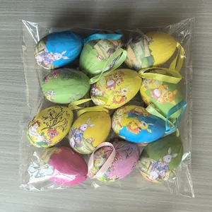 Set of colorful painted foam Easter eggs with hanging ribbons in clear plastic bag packaging