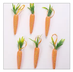 Set of six glittery orange Easter carrot ornaments featuring green tops and hanging ribbons