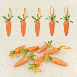 Set of glittery orange Easter carrot hanging ornaments with green leaves and ribbons
