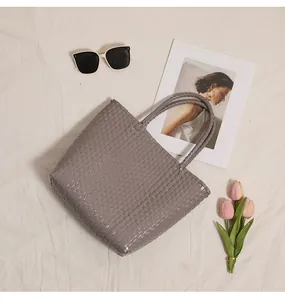 Handmade stylish purple plastic woven tote bag perfect for summer beach vacations