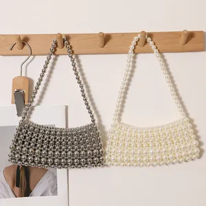Handgewebte Perlenbesetzte Unterarmtasche für Damen Mode Künstliche Perle Metallische Perlen Ausgeschnittene Schultertasche Kleine Designer Telefontasche