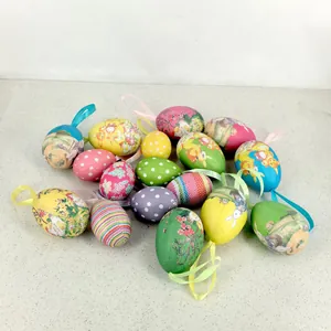 Assorted colorful painted Easter foam eggs with hanging loops for party decor