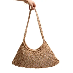 Borsa a tracolla in cotone macramè fatta a mano con design a rete e fodera interna