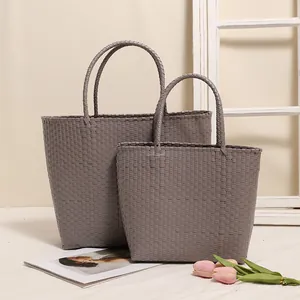 Hand-woven solid grey plastic tote bag set for shopping and beach vacations
