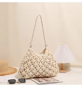 Elegant cream handmade hollow-out cotton rope woven shoulder bag for summer beach holidays