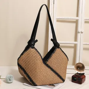 Large capacity French style straw tote bag with elegant black trim for beach vacations