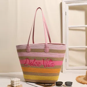 Grande borsa da spiaggia intrecciata a righe colorate con ricamo rosa Dolce Vita