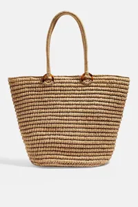 Bolso tote grande de paja tejida con asas de anillos de resina de carey