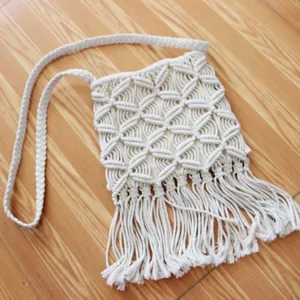 Handmade macrame crossbody bag with long fringe, boho style white cotton woven beach bag