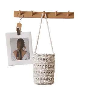Bolso tipo cubo minimalista de hilo de algodón tejido a mano con diseño calado para la playa