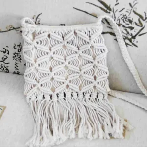 Bohemian white macrame woven shoulder bag with tassels for beach holidays