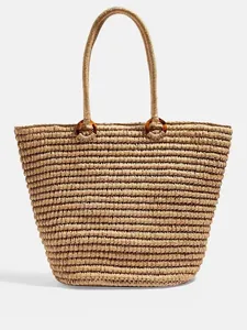 Bolso de paja grande y minimalista para playa con asas de anillos de resina ámbar