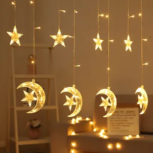 Cozy warm white LED star and moon curtain string lights for romantic bedroom decoration