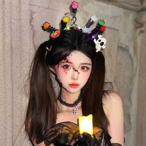Glowing Halloween headband with colorful pipe cleaners and spooky charms for festive parties