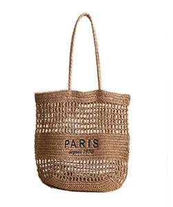 Sac de plage en paille tressée avec broderie PARIS et design ajouré élégant