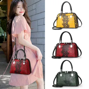 Bolso de mano elegante con patrón de piedra para mujer con modelo y varios colores