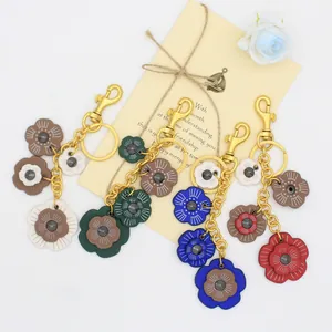 Llavero Retro de Cuero PU con Flor de Camelia Adorno Floral Hecho a Mano para Bolso Mujer Colgante de Anillo de Llave