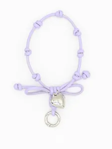 Detailed view of lavender braided phone lanyard with bow knot and silver heart charm