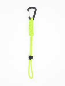 Detailed view of neon green braided paracord keychain with black carabiner clip