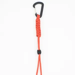 Outdoor tactical carabiner with red hand-woven paracord lanyard and adjustable buckle