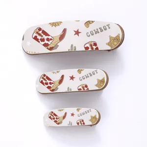 Three pieces vintage cowboy themed hair clips set with cowhide and star patterns