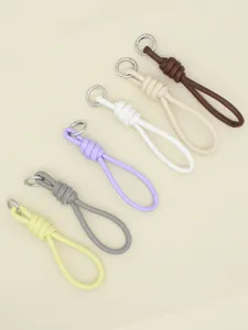 Minimalist set of colorful PU leather woven wristlet strap keychains with metal clasps