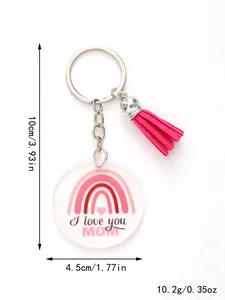 Detail view of acrylic rainbow keychain with 'I love you MOM' text and pink tassel