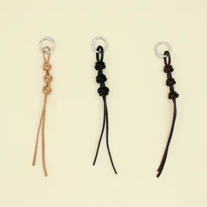 Hand Woven Genuine Leather Keychain Creative Cowhide Rope Bag Charm Vintage Knot Ornament For Women Men Gift