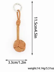 Brown hand-woven PU leather ball keychain charm with measurement details and weight