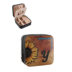 Detailed view of sunflower print PU leather jewelry box with mirror and ring slots