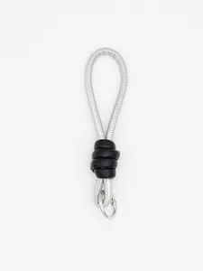 Silver braided cord wrist strap keychain with black leather knot and metal ring detail